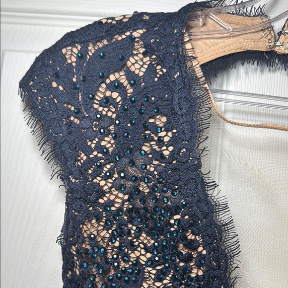 Navy Blue Evening Gown Nude Lining with Lace Overtop Beaded Plunging Neckline - Picture 3 of 16